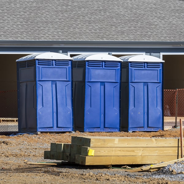 how often are the portable restrooms cleaned and serviced during a rental period in Forks